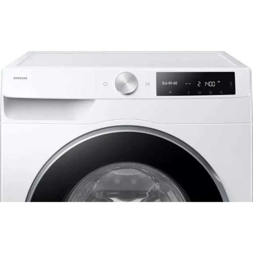 Samsung Series 6 white front-load washing machine with 9kg capacity, digital display showing Eco 40-60 cycle, metallic control dial and black trim around drum door
