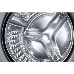 Close-up interior view of Samsung Series 6 washing machine drum showing stainless steel perforated basket with distinctive three-blade impeller design and textured wash surfaces