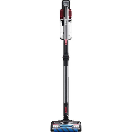 Shark Anti Hair Wrap cordless upright vacuum cleaner with digital display, featuring black pole, burgundy and white upper body, and blue brush roll head with anti hair wrap technology