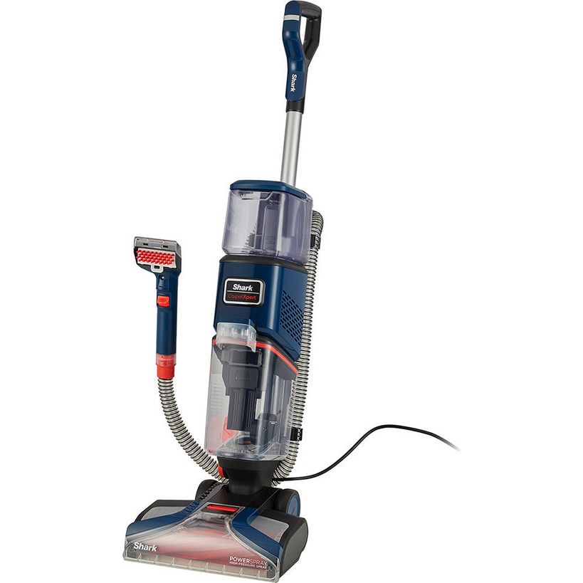 Shark CarpetXpert 3.15 Litre deep carpet cleaner in navy blue and silver with red accents, featuring a tall upright cleaning head, detachable hose with spray nozzle attachment, and wide base platform on white background