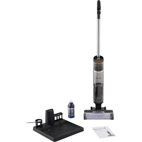 Shark HydroVac cordless vacuum cleaner in charcoal grey and silver with charging dock, cleaning solution bottle, microfiber pad and instruction manual displayed against white background