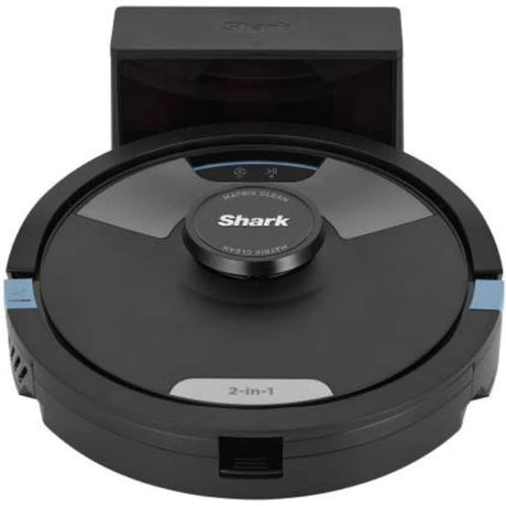 Shark Matrix Plus 2-in-1 robot vacuum with black circular base, central control hub, and docking station in charcoal gray, featuring blue accent panels and touch controls