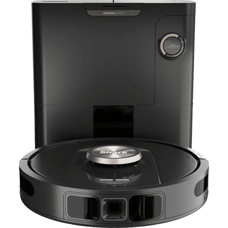 Shark PowerDetect self-emptying robot vacuum in black with docking station, featuring circular disc design with central silver logo and front sensor array