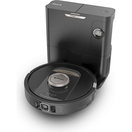 Shark PowerDetect RV2820VEUK self-emptying robot vacuum in black with circular disc base and dark charging dock featuring PowerDetect label and control dial
