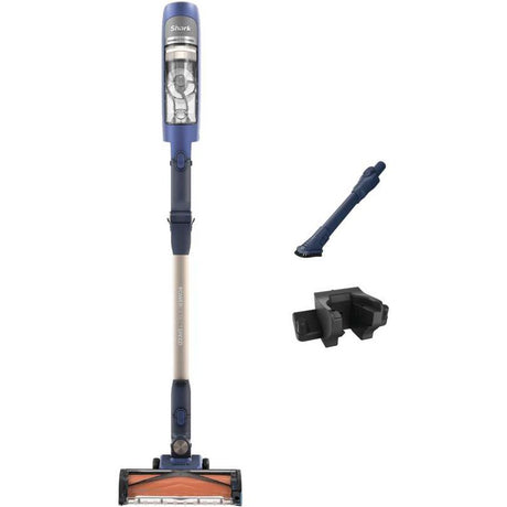 Shark PowerDetect Speed cordless stick vacuum in ultramarine blue and silver with motorized brush head, shown with detachable accessories including crevice tool and wall mount dock