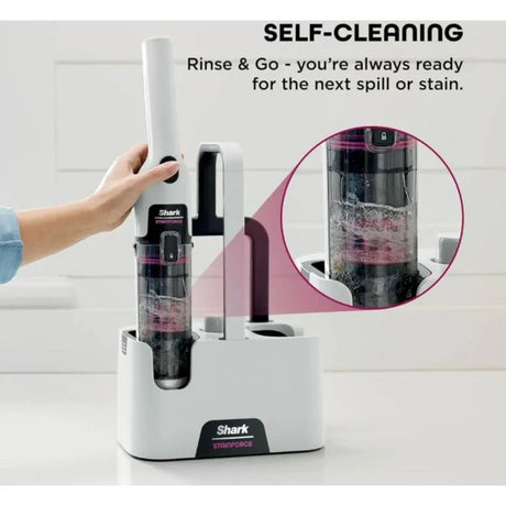 Shark StainForce cordless spot cleaner in white and black with self-cleaning feature, showing handheld device being held, docking station base, and close-up of water tank demonstrating rinse and go functionality