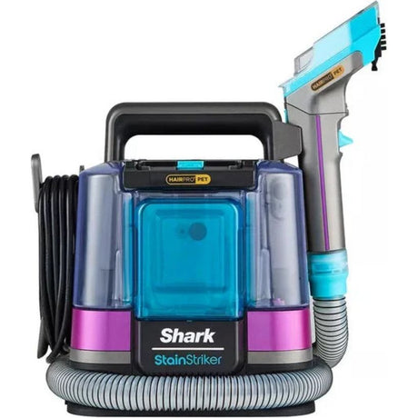 Shark StainStriker HairPro Pet portable carpet cleaner with turquoise and magenta design, featuring dual water tanks, hose attachment, and spray gun accessory on white background