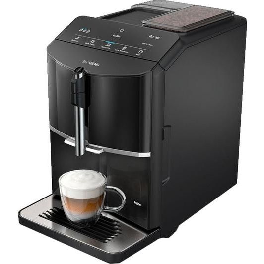 Siemens EQ300 black fully automatic bean to cup coffee machine with touch controls and display, dispensing cappuccino with milk froth into glass cup on drip tray
