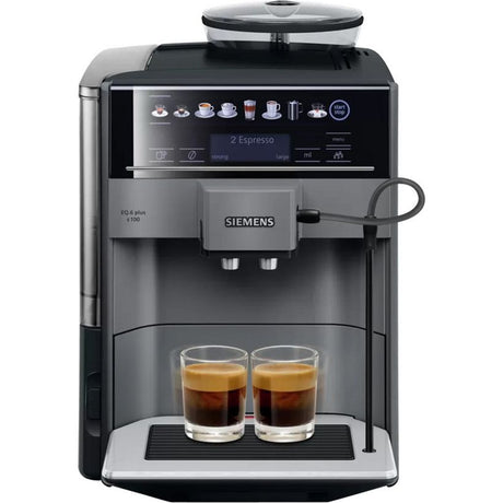 Siemens EQ6 plus bean to cup coffee machine in black and stainless steel with digital display showing espresso selection, dispensing two shots of espresso into clear glass cups on the drip tray