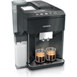 Siemens EQ500 fully automatic coffee machine in black with stainless steel accents, featuring two espresso cups filled with freshly brewed coffee, water reservoir on left side, and illuminated control panel with beverage icons on top