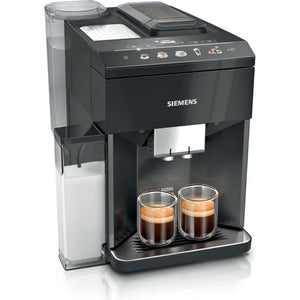 Siemens EQ500 fully automatic coffee machine in black with dual espresso cups filled with freshly brewed coffee, water reservoir on left side, and illuminated control panel with multiple beverage buttons on top