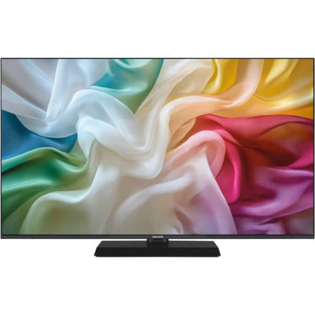 Walker 55 inch 4K Ultra HD Smart TV displaying colorful flowing fabric design in blue, green, white, yellow, pink and red tones on black bezel with stand