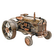 Model of an old-fashioned tractor with a detailed design on a white background