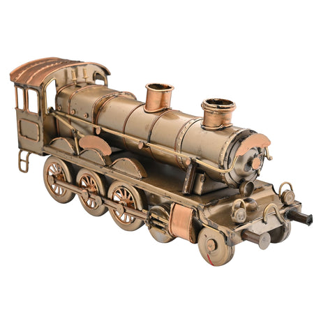 Bronze-colored model of a steam locomotive on a white background