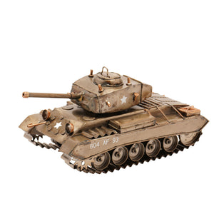 Detailed bronze-colored metal tank ornament featuring turret with gun barrel, tracked treads, and military markings including "604 AF 93" and white star insignia, displayed against white background
