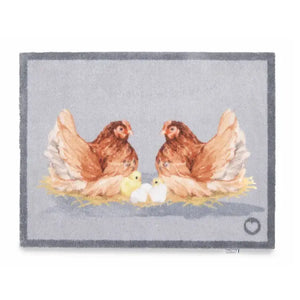 Hug Rug doormat featuring two brown hens with yellow chicks and white eggs on a grey background with grey border, 65cm x 85cm size