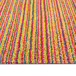 Hug Rug doormat with bright candy stripe pattern featuring vertical stripes in pink, red, yellow, green and blue, 50cm x 75cm size shown from above perspective