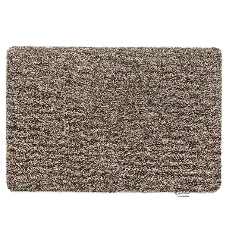 Hug Rug doormat 50cm x 75cm in coffee brown colour with textured loop pile surface and rounded corners on white background