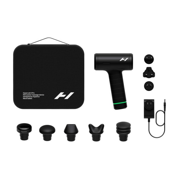 Hyperice Hypervolt 3 Pro massage gun product display showing black carrying case, handheld device with green accent band, five interchangeable massage heads, two attachment balls, power adapter and charging cable on white background