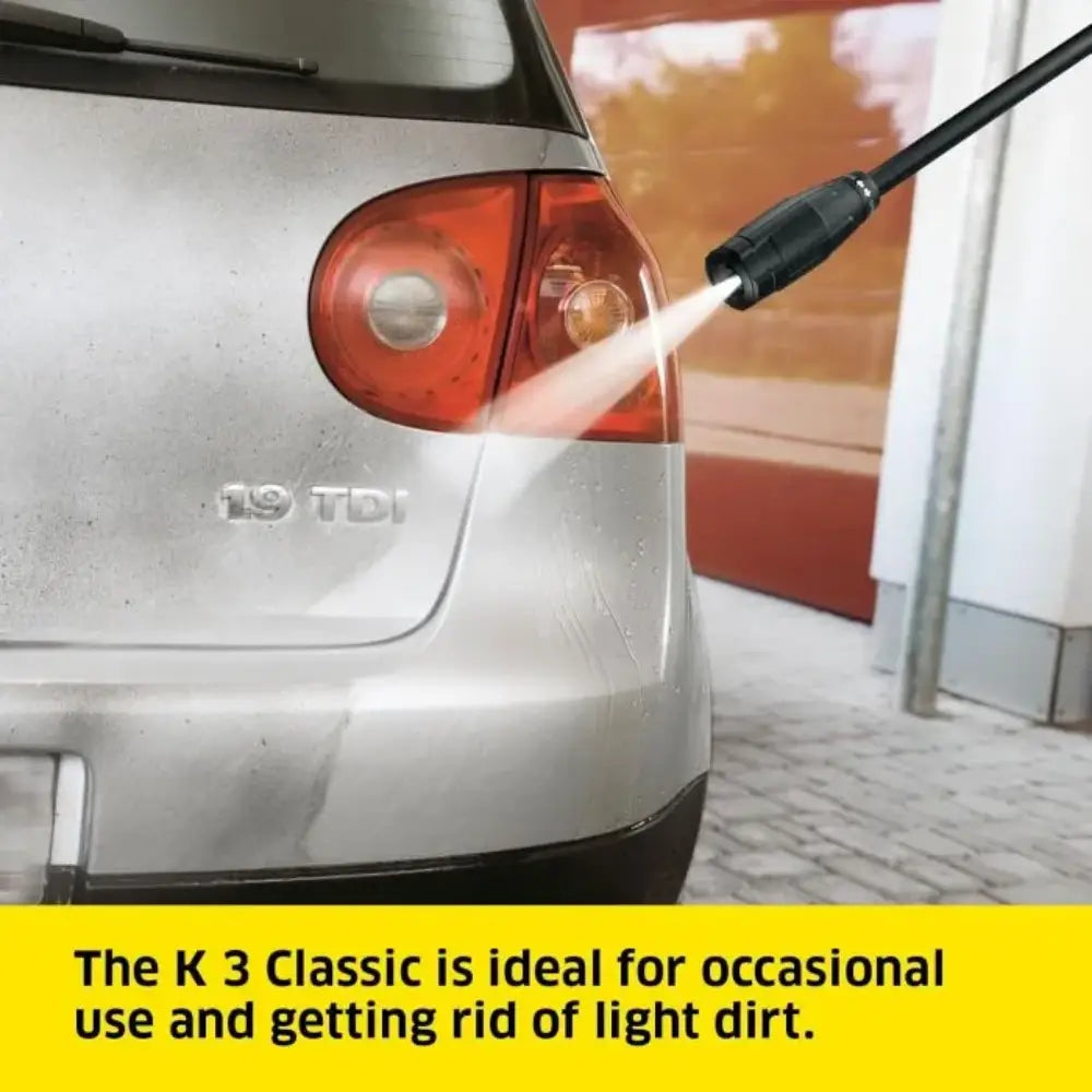 Car being washed with a high-pressure water hose, with text about the K 3 Classic car.