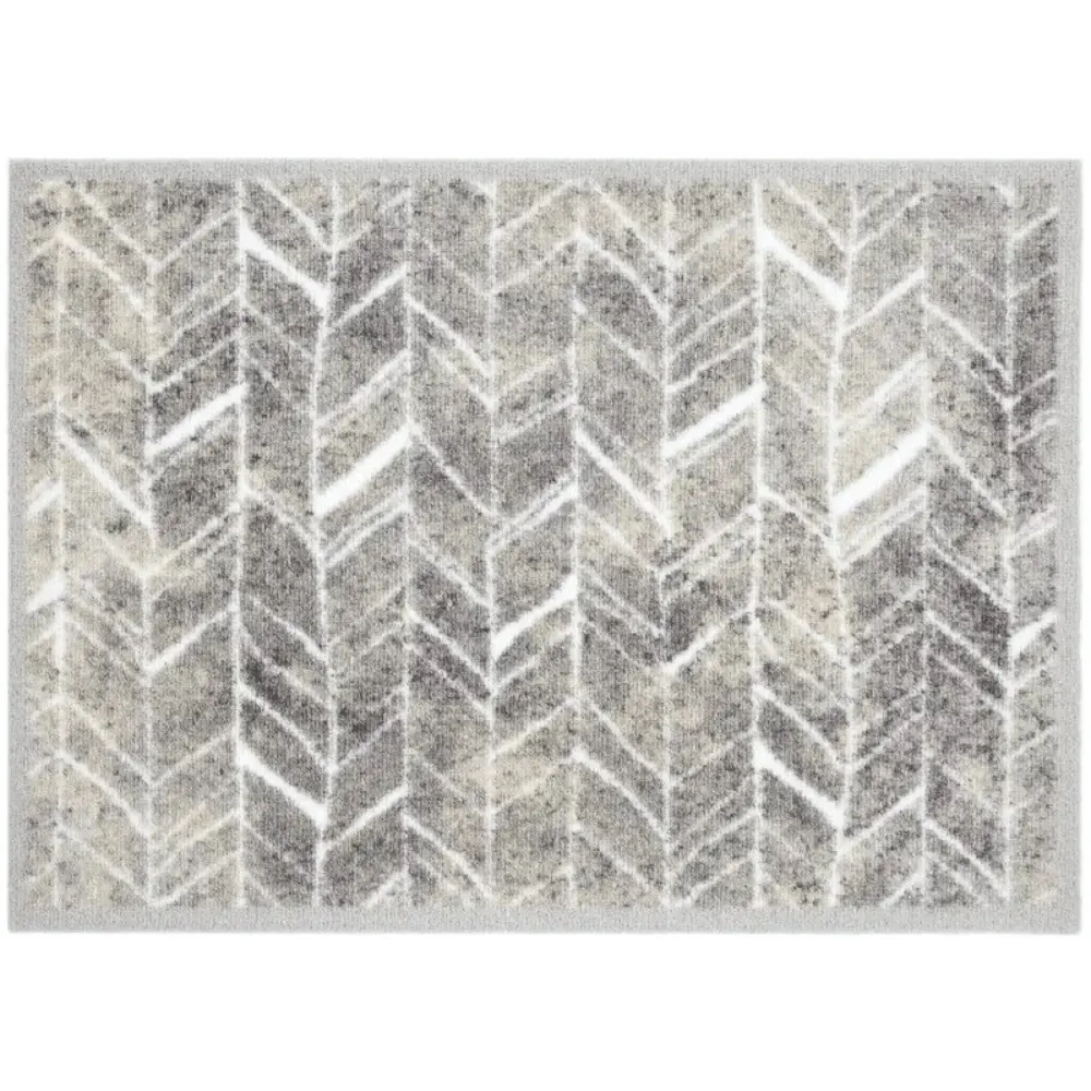 Miabella doormat 50cm x 70cm featuring a geometric herringbone pattern in light blue, grey and white with textured pile weave surface design