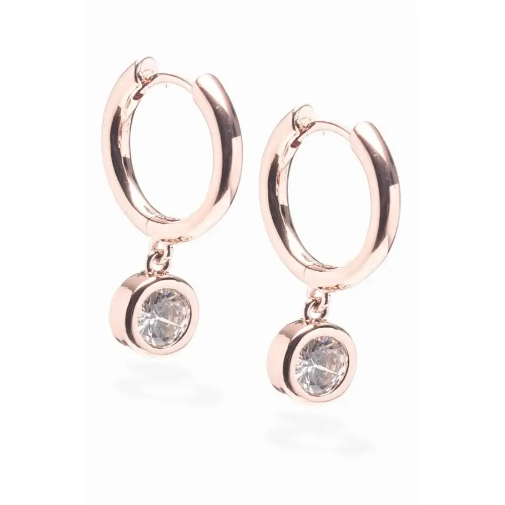 Pair of rose gold round hoop earrings with dangling diamond charms set in bezel settings, featuring polished metallic finish and hinged closures