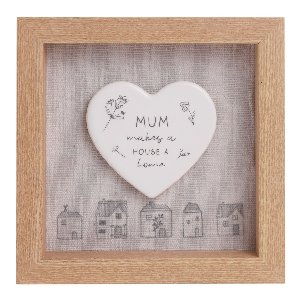 Heart-shaped ceramic plaque with 'Mum makes a house a home' text in a wooden frame.