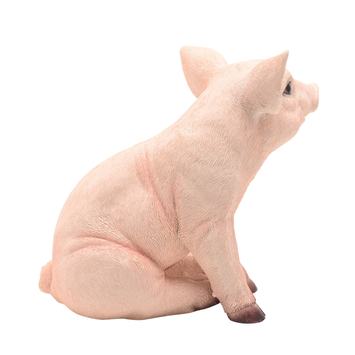 Naturecraft sitting pig figurine 23.5cm in pale pink resin with detailed fur texture and brown hooves, shown from side angle against white background
