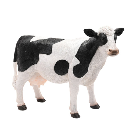 Naturecraft standing cow figurine 34cm with black and white patches, realistic painted details, pink nose and hooves, displayed against white background