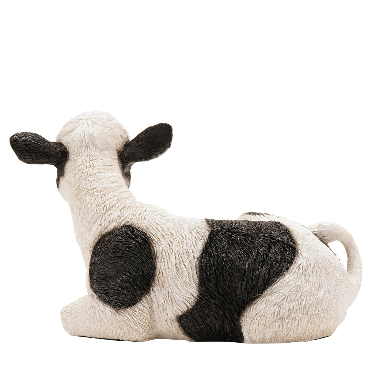 Naturecraft sitting cow figurine in cream and black with textured fur detail, 20.5cm height, realistic farm animal decoration on white background