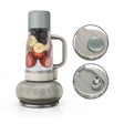 Ninja BlendBOSS stone grey tumbler blender with fruit smoothie ingredients shown in clear pitcher, four control buttons visible on base, includes close-up views of twist-lock lid and blending attachment