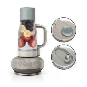 Ninja BlendBOSS stone grey tumbler blender with fruit smoothie ingredients shown in clear pitcher, four control buttons visible on base, includes close-up views of twist-lock lid and blending attachment