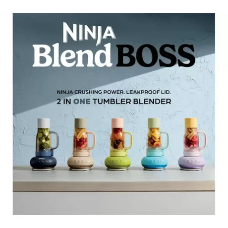 Ninja BlendBOSS 2-in-1 tumbler blender in cyberspace black with leakproof lid, shown alongside four additional color variants in beige, green, turquoise, and purple, each filled with blended fruits and ingredients, displayed on white surface against textured gray background