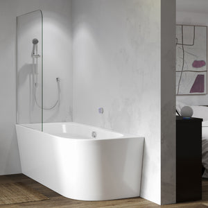 Modern white corner bathtub with integrated glass shower screen and chrome showerhead in minimalist bathroom with white walls and wooden flooring