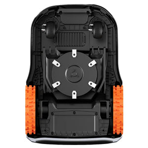 Overhead view of Segway Navimow i210 robotic lawn mower showing black chassis with orange rubber tracks, central circular cutting blade with white fasteners, black wheel assemblies, and ventilation grilles
