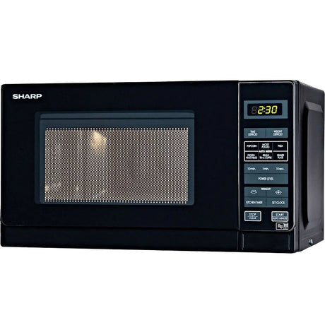 Black Sharp microwave oven on a white background
