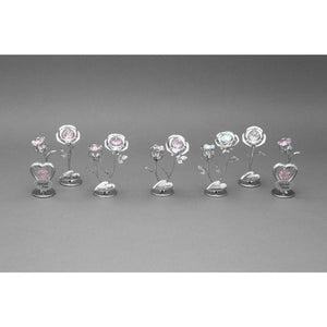 Chrome plated decorative rose and rose bud figurines with pink and clear crystals on silver bases engraved with Special Mum text, displayed in a lineup against a gray background