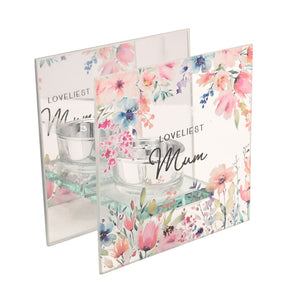Floral tealight holder gift set featuring watercolor garden flowers in pink, blue and purple with "Loveliest Mum" text, includes glass votive holders and decorative packaging with matching botanical design