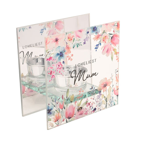 Floral tealight holder gift set featuring watercolor garden flowers in pink, blue and purple with "Loveliest Mum" text, includes glass votive holders and decorative packaging with matching botanical design