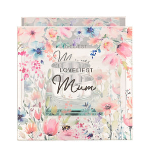Glass tealight holder with Loveliest Mum text surrounded by watercolor floral design featuring pink, blue and purple flowers on cream packaging box with coordinating floral exterior