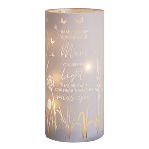 Frosted glass cylindrical tube light in soft mauve with gold foil botanical designs including dandelions and butterflies, featuring engraved memorial text reading "In Memory of a Wonderful Mum, You Are the Light That Shines in Our Hearts Forever, Miss You"